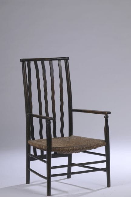 ENGLISH FURNITURE
Black-stained beech armchair wit