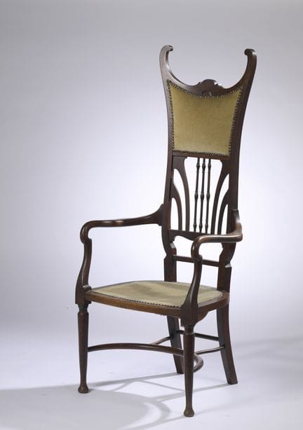 ARTS &amp; CRAFTS
Stained, molded wooden armchair 