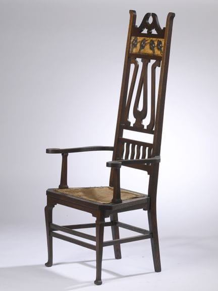 ARTS &amp; CRAFTS
Large, stained oak armchair with