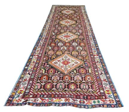 A Chila long rug Caucasus, 19th century   434 x 14