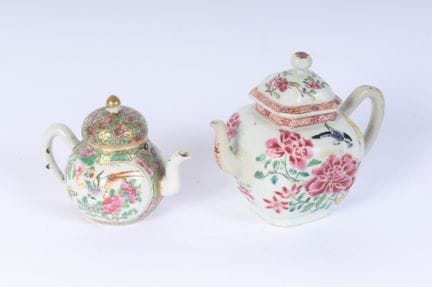 Set of two polychrome porcelain teapots from the l
