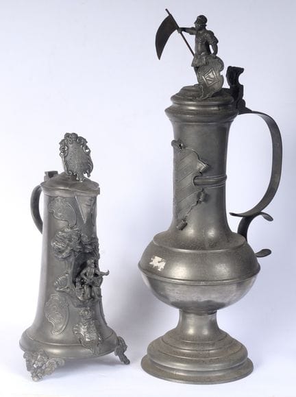 Set of two pewter pourers, late 19th century–early