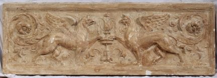 Architectural frieze featuring griffins and spiral
