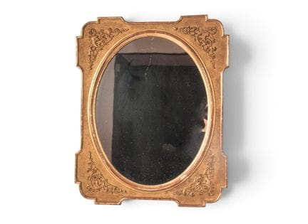 Gilded wooden mirror with oval shape first half of