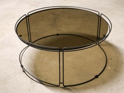 Coffee table with a gray lacquered metal frame and