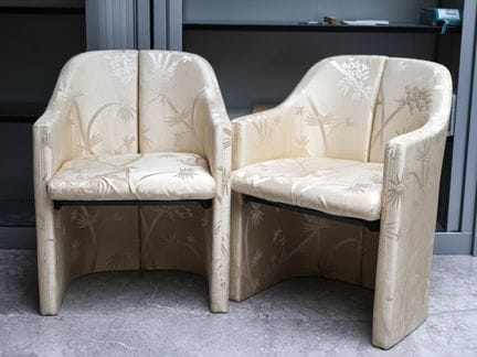 Pair of armchairs, upholstered in gold fabric with