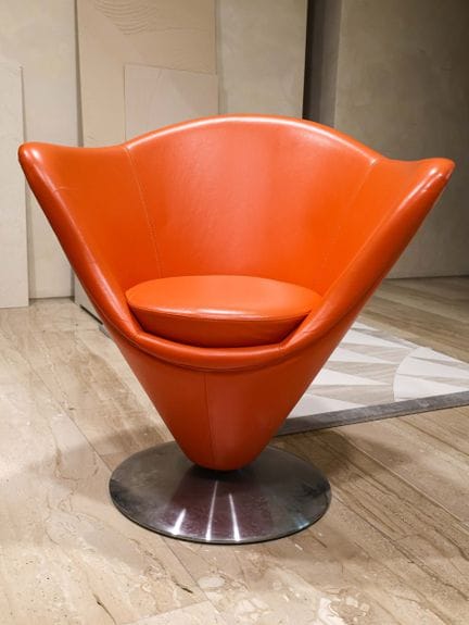 "Space Age" armchair in orange faux leather, with 
