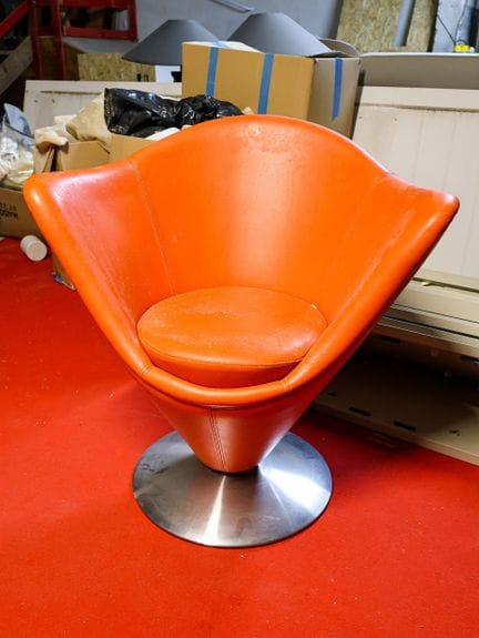 "Space Age" armchair in orange faux leather, with 