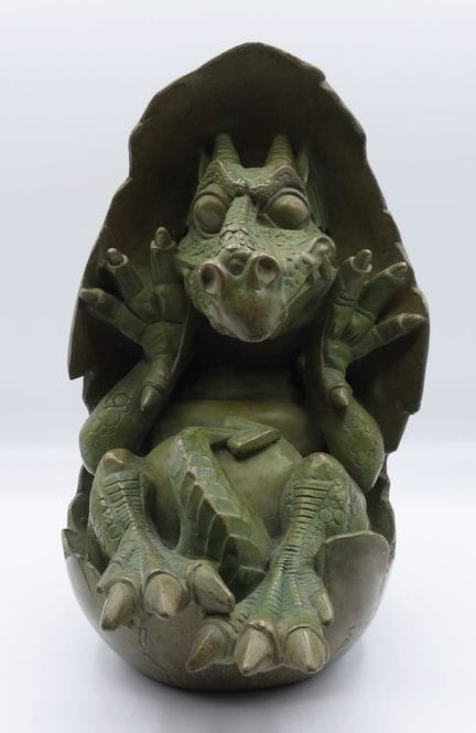 Boulesteix = Bebé Dragón, figura de bronce realiza