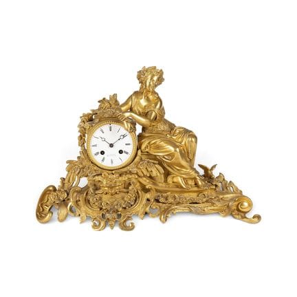 A GILT-BRONZE CLOCK SHOWING A GODDESS CERES Russia