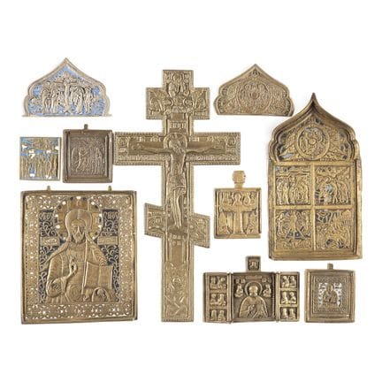 A COLLECTION OF TEN BRASS ICONS DEPICTING IMAGES O