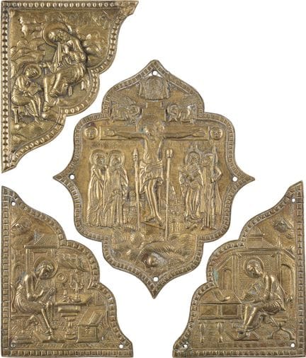A SET OF FOUR BRASS BIBLE COVERS DEPICTING THE CRU
