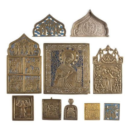 A COLLECTION OF TEN BRASS ICONS DEPICTING IMAGES O