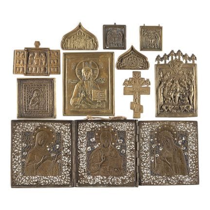 A COLLECTION OF TEN BRASS ICONS DEPICTING IMAGES O