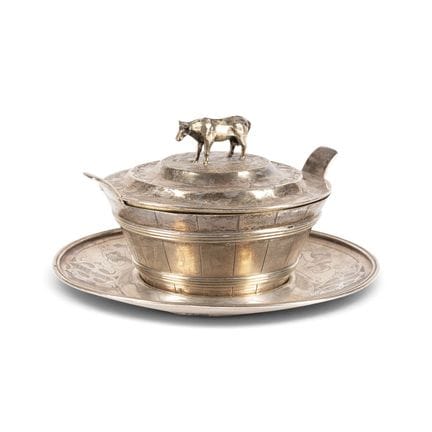 A SILVER TROMPE L'OEIL BUTTER DISH ON PRESENTOIR W