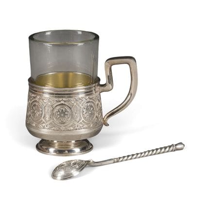 A SILVER TEA GLASS HOLDER AND TEASPOON IN ORIGINAL
