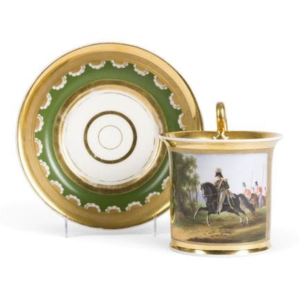 A LARGE PORCELAIN MILITARY CUP WITH A SAUCER Russi