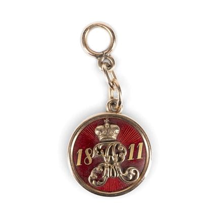 A GOLD AND GUILLOCHÉ ENAMEL GRADUATION JETON OF TH