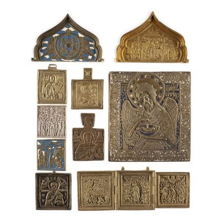 A COLLECTION OF TEN BRASS ICONS DEPICTING THE MOTH