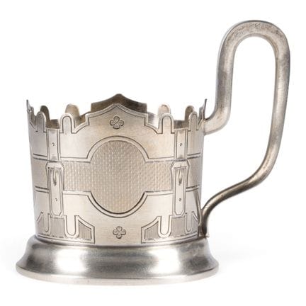 A SILVER TEA-GLASS HOLDER WITH BELT MOTIF Russian,