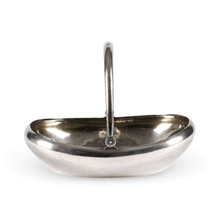 A SILVER BOWL WITH HANDLE AND ENGRAVED MONOGRAM Ru