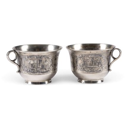 A PAIR OF FINE SILVER AND NIELLO CUPS AND SAUCERS 