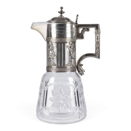A SILVER-MOUNTED GLASS DECANTER WITH ANTIQUE-STYLE