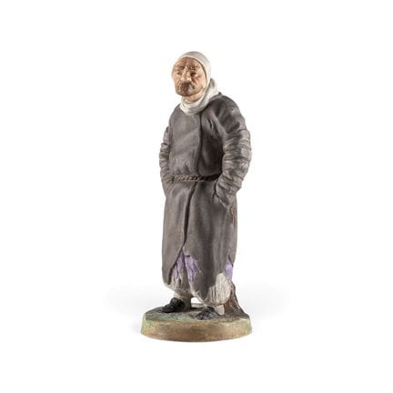 A BISCUIT PORCELAIN FIGURE 'PLYUSHKIN' FROM THE SE