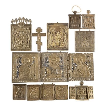 A COLLECTION OF TEN BRASS ICONS DEPICTING CRUCIFIX