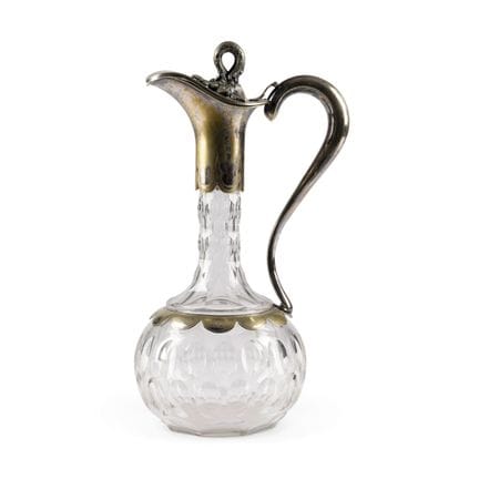 A METAL-MOUNTED GLASS DECANTER Circa 1900 Colourle