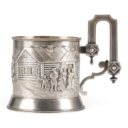 A FINE SILVER TEA-GLASS HOLDER WITH A PEASANT SCEN