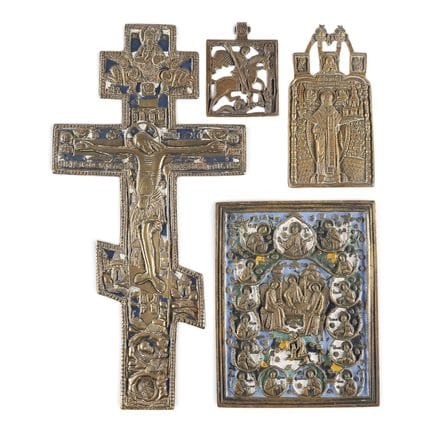 A COLLECTION OF FOUR BRASS ICONS DEPICTING CRUCIFI