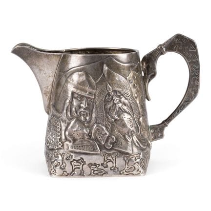 A SILVER CREAM JUG WITH BOGATYRS Russian, Moscow, 
