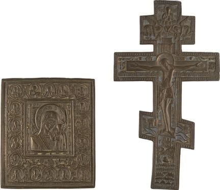 TWO BRASS ICONS DEPICTING CRICIFIX AND THE KAZANSK