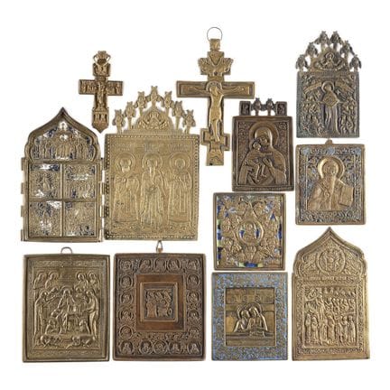 A COLLECTION OF TWELVE BRASS ICONS DEPICTING IMAGE