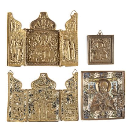 A COLLECTION OF FOUR BRASS ICONS SHOWING ST. NICHO