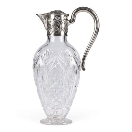 AN ART NOUVEAU SILVER-MOUNTED GLASS DECANTER WITH 