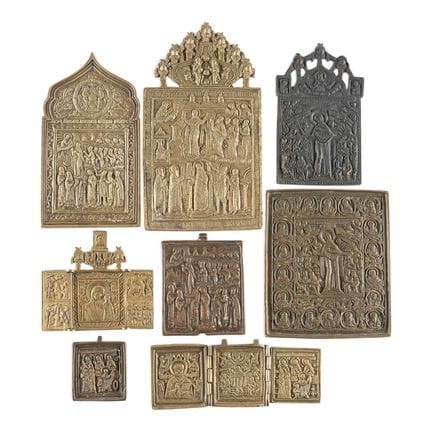 A COLLECTION OF EIGHT BRASS ICONS DEPICTING IMAGES