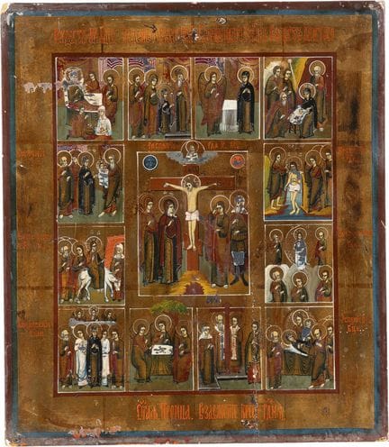 AN ICON DEPICTING THE CRUCIFIXION OF CHRIST AND TH