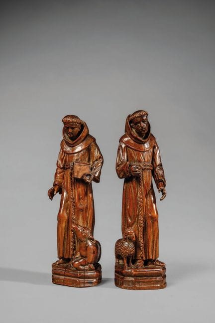 Paire de sujets en buis sculpté figurant Saint-Luc