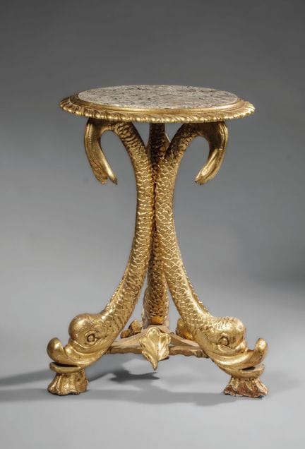 Italie
Guéridon ou table de milieu en bois doré et