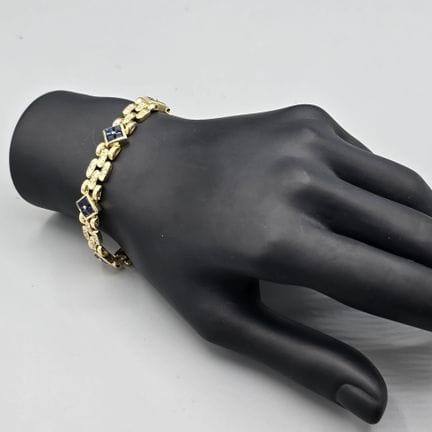 Bracelet articulé en or jaune 750°° formé de trois