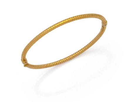 BRACELET JONC TORSADE en or jaune 18K (750/1000), 