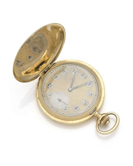 TASCHENUHR aus 18 Karat Gelbgold (750/1000) mit gl