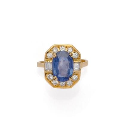 BAGUE en or jaune rhodié 18K (750/1000) centrée d’