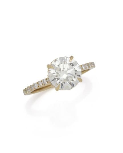 BAGUE-SOLITAIRE en or gris 18K (750/1000) surmonté