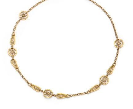 COLLANA in oro giallo 18 carati (750/1000) con mag