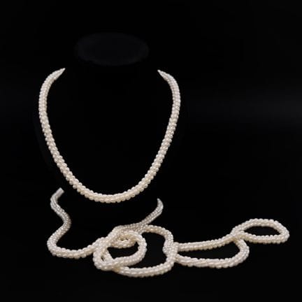 Important sautoir en perles tressées
Diam. : 81 cm