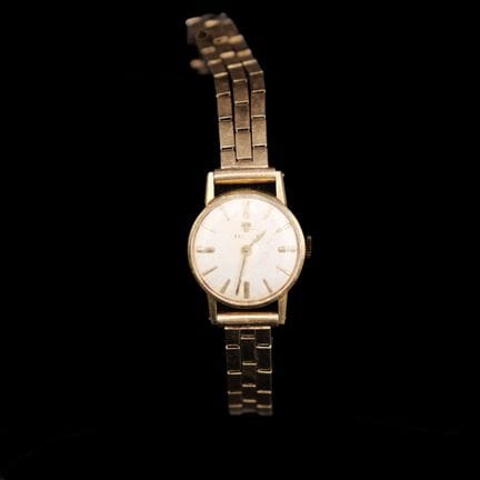 TISSOT 
Montre bracelet en or jaune 18K (750°/°°) 