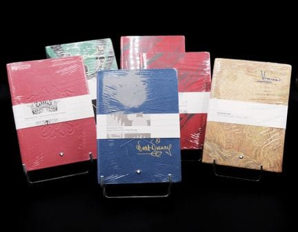 Set of 6 #146 MONT BLANC notebooks, including:
- T